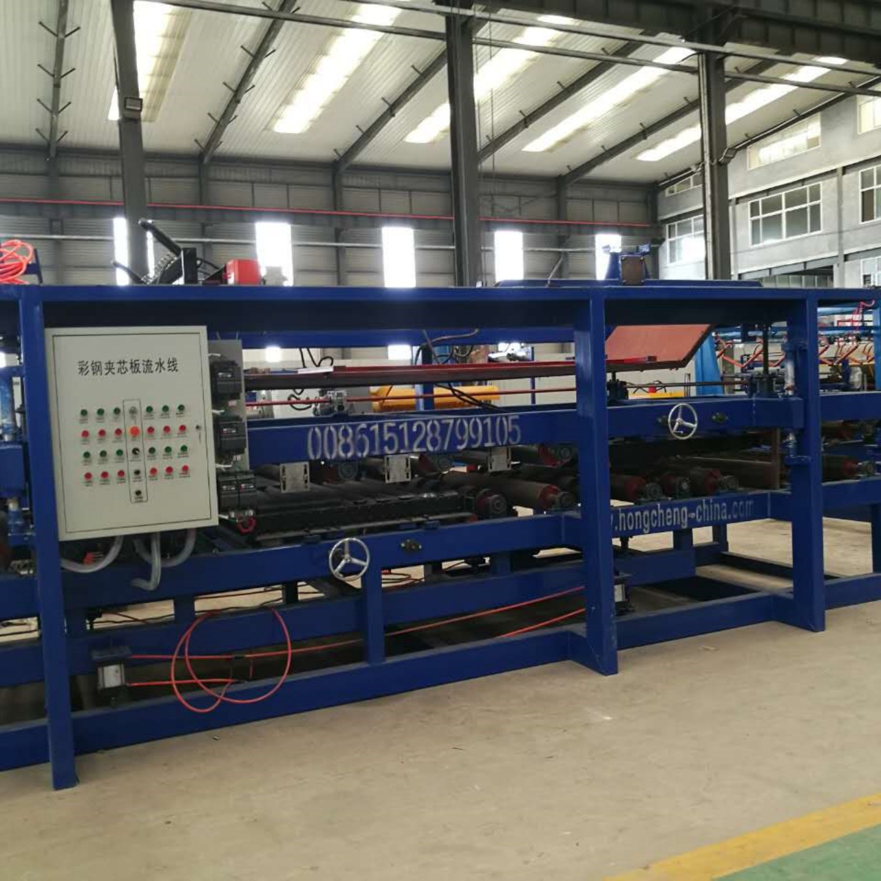 Sandwich panel production line for sandwich panels